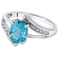 14К бело злато оригинално швајцарско сино топаз и дијамантски солитер бајпас овален прстен 1. карати